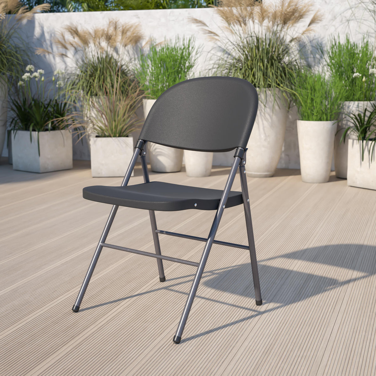 Flash Furniture 330 lb. Capacity Black Plastic Folding Chair with Charcoal Frame - Event Chair