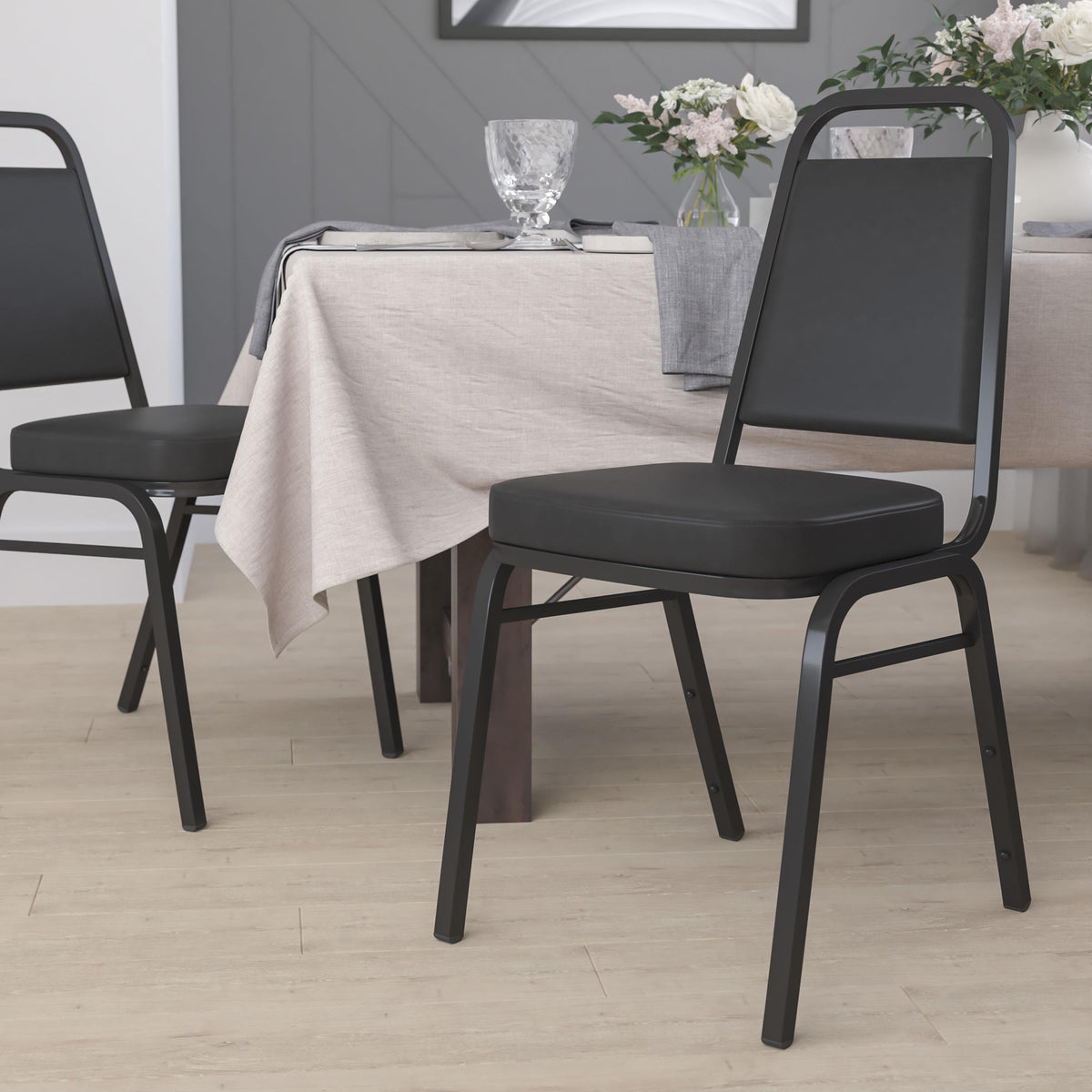 Flash Furniture Trapezoidal Back Stacking Banquet Chair in Black Vinyl with 2.5" Thick Seat