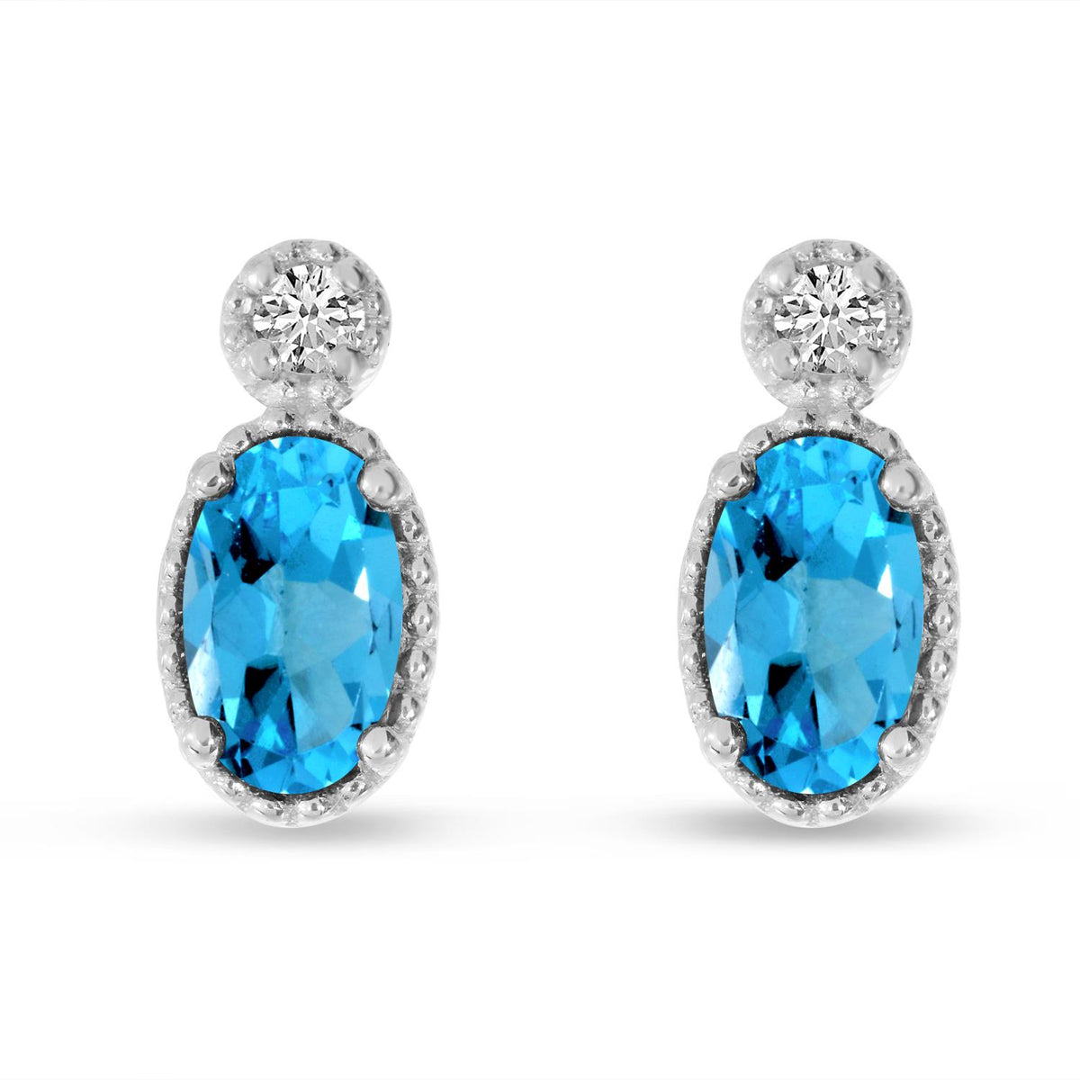 Distinctive 14K White Gold Oval Blue Topaz Earrings